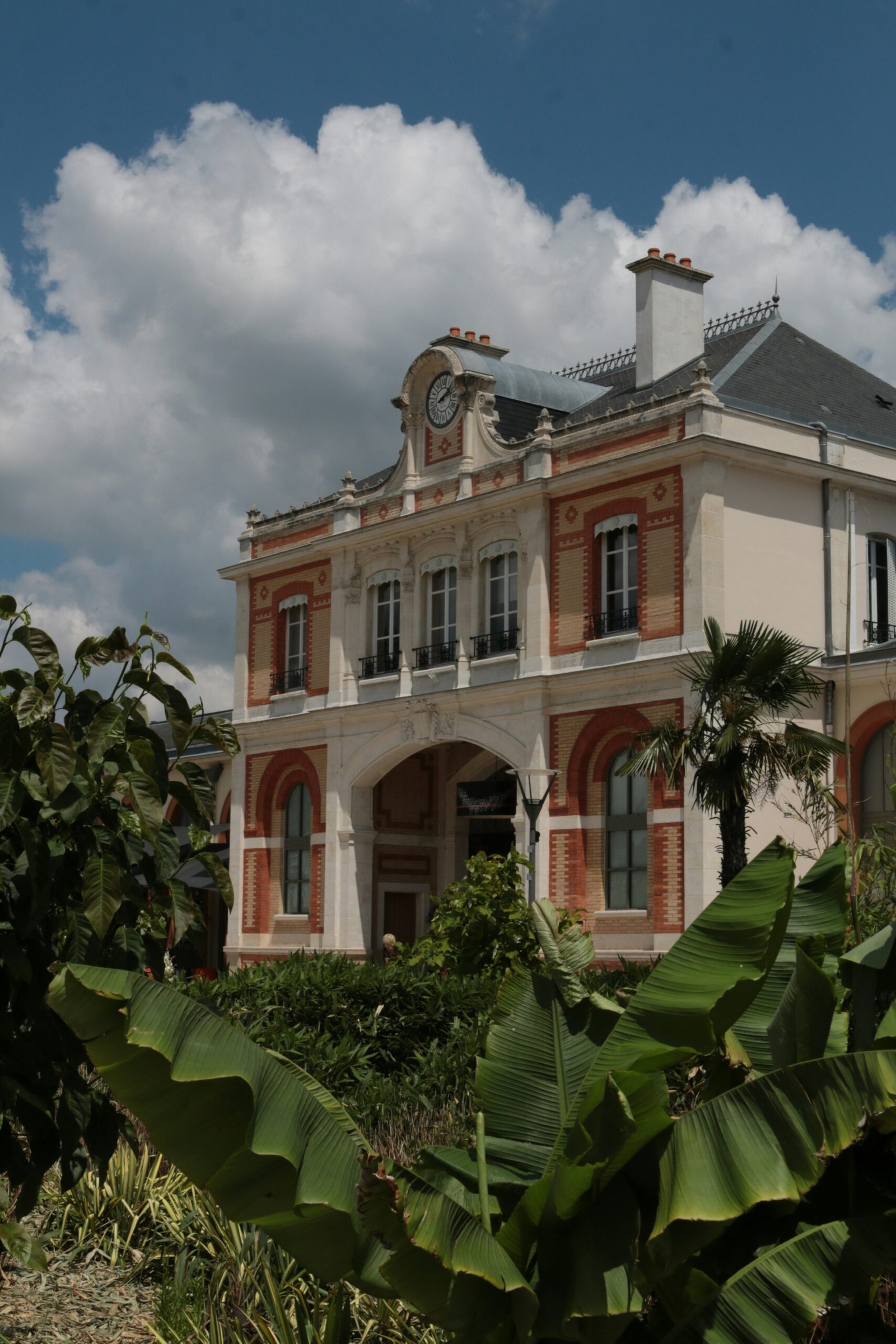 a large building with a clock on the top of it